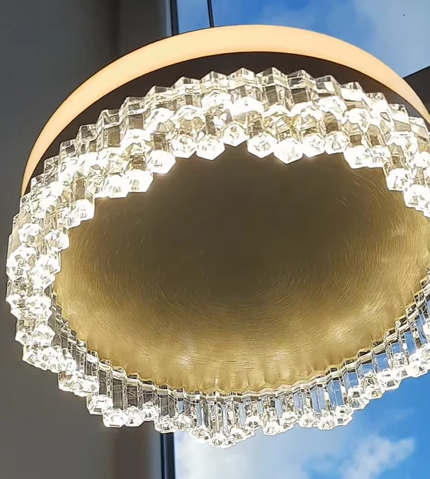 An elegant crystal LED ceiling lamp from the Lumen showroom